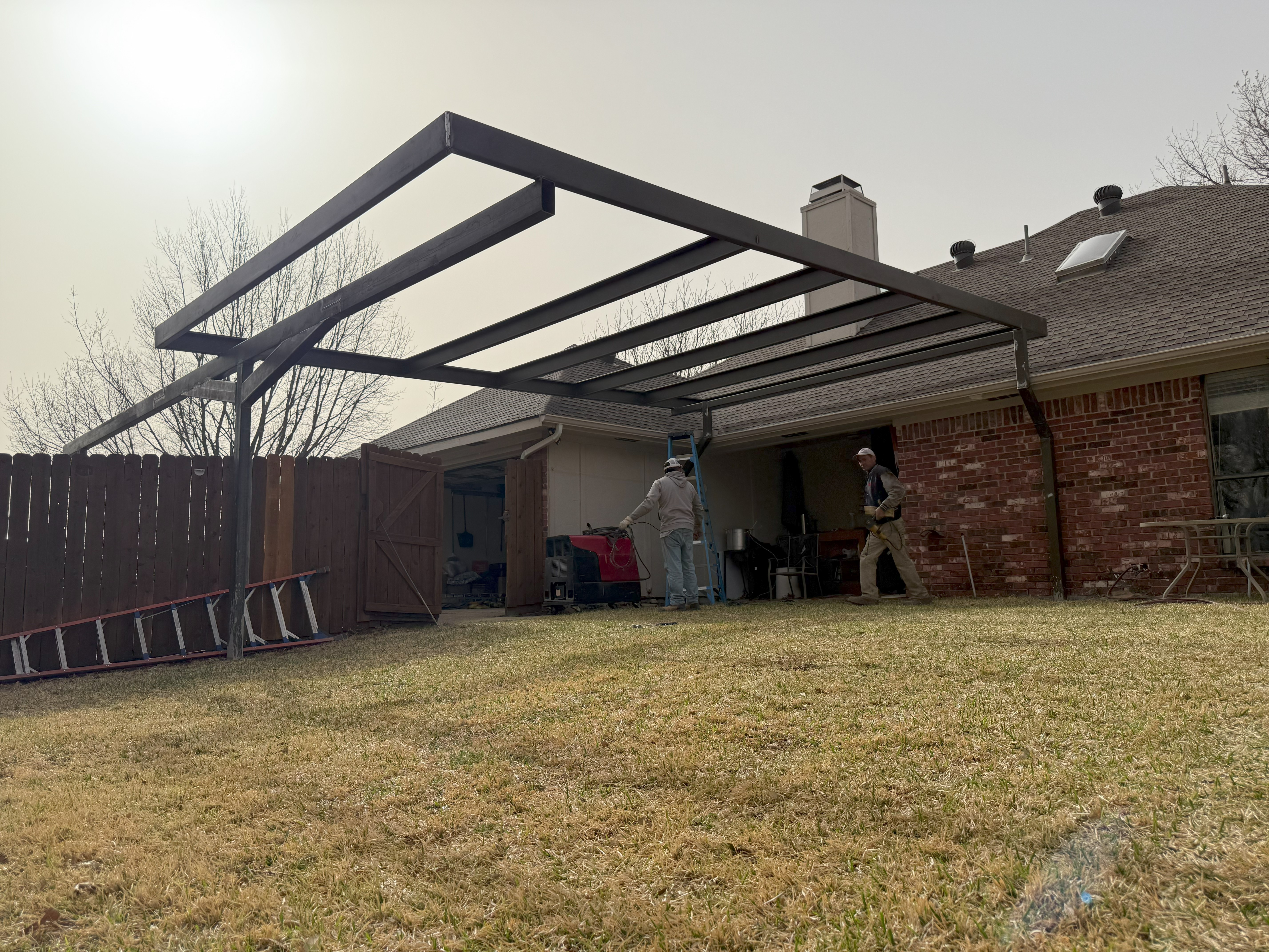 Residential steel carport and metal building construction